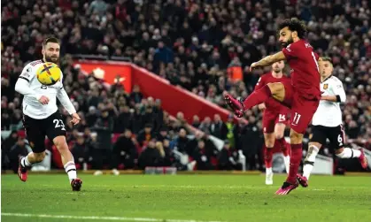  ?? Photograph: Peter Byrne/PA ?? Mo Salah scores the fourth of Liverpool’s seven goals the last time Manchester United visited Anfield, and were beaten 7-0 in March.