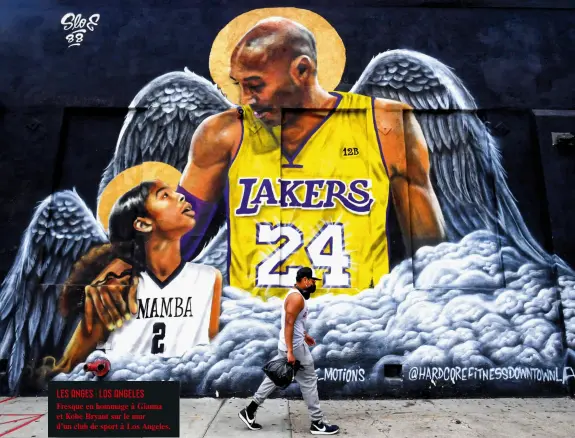  ??  ?? LES ANGES : LOS ANGELES Fresque en hommage à Gianna et Kobe Bryant sur le mur d’un club de sport à Los Angeles.