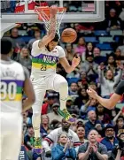  ?? GETTY IMAGES ?? Unsettled star Anthony Davis dunks for the Pelicans against Minnesota yesterday.