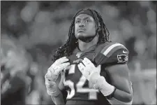  ?? ELISE AMENDOLA/AP PHOTO ?? In this Oct. 10, 2019, file photo, New England Patriots linebacker Dont’a Hightower watches from the sideline during the second half of al game against the New York Giants in Foxborough, Mass. Hightower has decided to opt out of the 2020 season. Hightower’s decision was made out of concern for the health of his fiancée and child, who was born earlier this month.