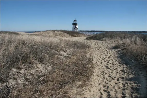  ?? PHOTO COURTESY MASSACHUSE­TTS OFFICE OF TRAVEL AND TOURISM ?? A visit to Nantucket in the winter affords visits to landmarks, such as the Brant Point Lighthouse, without the summer crowds.