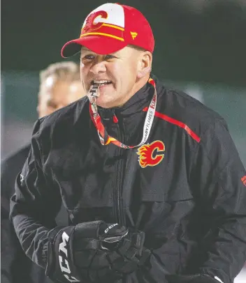  ?? LIAM RICHARDS / THE CANADIAN PRESS ?? Calgary Flames head coach Bill Peters is alleged to have hurled two N-word-filled rants against a former player.