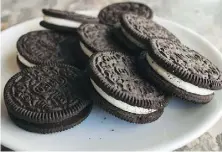  ?? MANDEL NGAN/GETTY IMAGES/FILES ?? You might be surprised to learn that Oreo cookies are vegan. But they’re at risk for cross-contaminat­ion with milk.