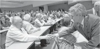  ?? Brett Coomer / Houston Chronicle ?? Professor Emil Freireich, left, joined the MD Anderson Cancer Center in the mid-1960s and was the director of the center’s Adult Leukemia Research Program for 30 years from 1985 to 2015.