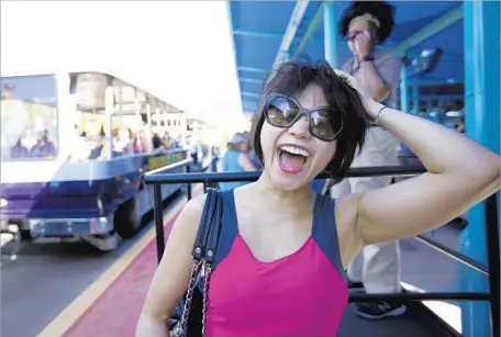  ?? Francine Orr Los Angeles Times ?? PIANIST Yuja Wang chose Universal Studios as the spot for an interview because she’s a huge film buff: “I watch so many on the flights.”