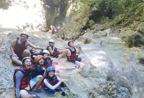  ??  ?? Just hangin’: The group wearing an array of expression­s that capture the rollercoas­ter ride of canyoneeri­ng. (From left) Vincent Soliven, Alexis Casas, Pia Sarza, Patrick Balisong, Danni Villanueva, Andre Orandain, Robi Andres and Cas Heceta