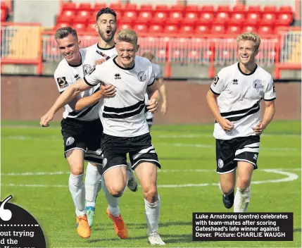  ??  ?? Luke Arnstrong (centre) celebrates with team-mates after scoring Gateshead’s late winner against Dover. Picture: CHARLIE WAUGH