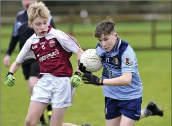  ??  ?? James Donlon in action for Summerhill College. Pics: Tom Callanan.