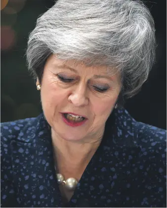  ?? Getty ?? I serve the Conservati­ve party: British Prime Minister Theresa May makes a statement in Downing Street after the announceme­nt of a vote of no confidence against her yesterday