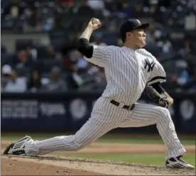  ?? JULIE JACOBSON, THE ASSOCIATED PRESS ?? Yankees pitcher Masahiro Tanaka was on top of the Toronto Blue Jays all afternoon Friday in New York. Tanaka struck out 15 batters in seven innings in a 4-0 victory.