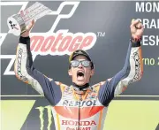  ?? REUTERS ?? Honda’s world champion Marc Marquez celebrates on the podium.