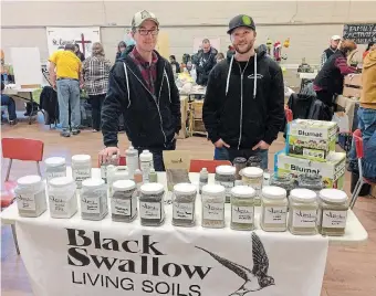  ?? PHOTOS COURTESY OF MASTER GARDENERS OF NIAGARA ?? Nathan Knechtel, owner of Black Swallow Living Soils, and Andres Kimsto, pictured at the Niagara Seedy Saturday event in 2019, will have a booth at the Niagara Seedy Sunday event this year.