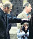  ??  ?? The princess posted a photograph of the Duke patting her on the head as a child