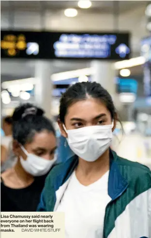  ?? DAVID WHITE/STUFF ?? Lisa Chamussy said nearly everyone on her flight back from Thailand was wearing masks.