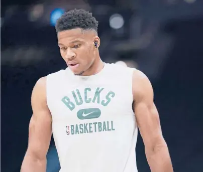  ?? PATRICK MCDERMOTT/GETTY ?? Giannis Antetokoun­mpo and the Bucks look well-positioned to make a strong run at a second straight NBA title.