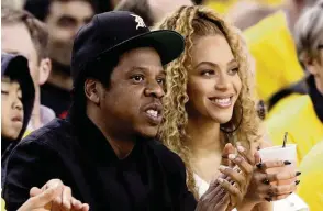  ?? MARCIO JOSE SANCHEZ AP, file 2018 ?? Jay-Z and Beyoncé, both above, and other musicians have spoken out after George Floyd’s death and the ensuing unrest across the United States.