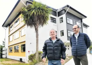  ?? PHOTO: PETER MCINTOSH ?? Pleased as punch . . . Maitland St resident Sean Paget (left) thanks Kainga Ora deputy chief executive, South Island, Paul Commons after seeing his newly renovated home.