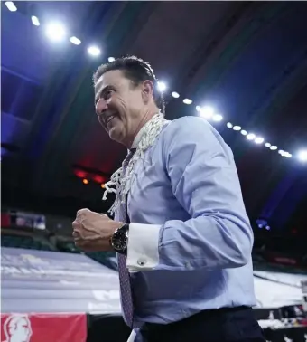  ?? AP PhoToS ?? DANCIN’: Iona head coach Rick Pitino, above, has his team in the NCAA tournament. Illinois’s Andre Curbelo, right, reacts after an Ohio State turnover during overtime in the Big Ten Conference tournament Sunday.