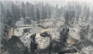  ?? PHOTO: TNS ?? Grim site . . . An aerial view of Paradise off Clark Rd, part of the Camp Fire that has burnt more than 7000 structures.