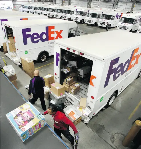  ?? MARK LENNIHAN / THE ASSOCIATED PRESS FILES ?? FedEx Corp. is one of the current customers of Canada’s Pure Industrial Real Estate Trust.