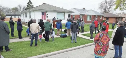  ?? MICHAEL SEARS / MILWAUKEE JOURNAL SENTINEL ?? David Crowley speaks to those gathered after being sworn in May 4. Milwaukee County Judge Joe Donald swore in the new county executive in front of Crowley’s home at 3737 N. 77th St. in Milwaukee.