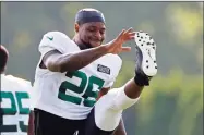  ?? Adam Hunger / Associated Press ?? Jets running back Le'Veon Bell (26) stretches during Tuesday’s practice in Florham Park, N.J.