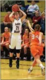  ??  ?? Boyertown’s Avery Sweisfort (21) shoots a 3-pointer over the defense of Perkiomen Valley’s Kelly Owens during the second quarter Tuesday.