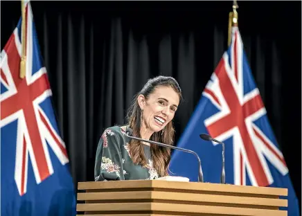  ?? ROBERT KITCHIN/STUFF ?? Jacinda Ardern’s relief was clear as she dropped alert levels yesterday. But the Government’s Covid playbook needs some rewriting.