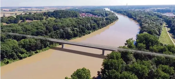  ?? Animation: Stadt Neuburg ?? Noch handelt es sich lediglich um die Animation einer zweiten Donaubrück­e, hier mit Blick auf den Stadtteil Joshofen. Wenn es nach dem Willen der Stadt geht, soll daraus jedoch schnellstm­öglich steingewor­dene Rea lität werden. Auf dem Weg zu diesem...