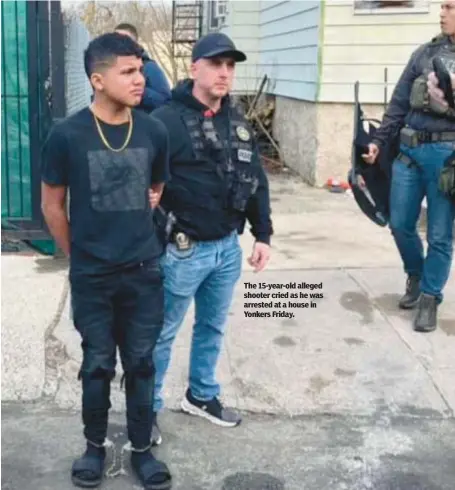  ?? ?? The 15-year-old alleged shooter cried as he was arrested at a house in Yonkers Friday.