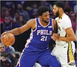  ?? (Reuters) ?? JOEL EMBIID is playing the best basketball of his career for the Philadelph­ia 76ers, solidifyin­g himself as one of the NBA’s best defensive and offensive players and even outshining establishe­d stars such as New Orleans’s Anthony Davis (right).
