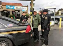  ?? San Joaquin County Sheriff’s Office via AP ?? San Joaquin County Sheriff’s deputies arrest Randall Saito on Wednesday in Stockton, Calif. Saito, who escaped from a psychiatri­c hospital in Hawaii, was recaptured as the result of a taxi driver’s tip.