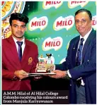  ??  ?? A.M.M. Hilal of Al Hilal College Colombo receiving his colours award from Manjula Kariyawasa­m