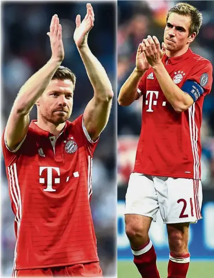  ?? — AFP ?? Tough acts to follow: Bayern Munich’s Xabi Alonso (left) and Philipp Lahm were key figures in two of the 21st century’s most incredible matches.