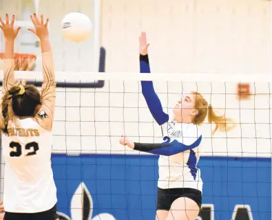  ?? PAUL W. GILLESPIE/CAPITAL GAZETTE PHOTOS ?? St. Mary’s senior Brooke Heary hits the ball over the net in the first set Thursday against John Carroll.