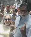  ??  ?? Actor Amitabh Bachchan, right, votes in 2019
