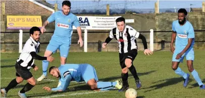  ??  ?? ■
Action from Shepshed Dynamo’s home defeat at the hands of Rugby Town.
Picture by Steve Straw.