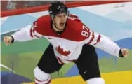  ?? PAUL CHIASSON/THE CANADIAN PRESS FILE PHOTO ?? Sidney Crosby started the celebratio­n with his golden goal in overtime to beat the U.S. at the 2010 Olympics on home ice.