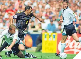  ??  ?? Colin Calderwood in action against England at Euro 96.
