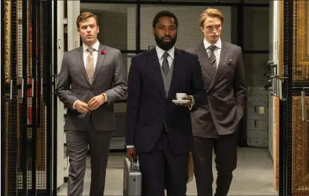  ??  ?? Tenet with Jack Cutmore-Scott, John David Washington and Robert Pattinson