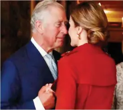  ??  ?? So pleased to see you: An admiring Charles greets Letizia