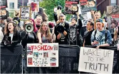  ??  ?? Fur brawl: Jonna Groneberg, far left, joins the protesters outside shows at London Fashion Week