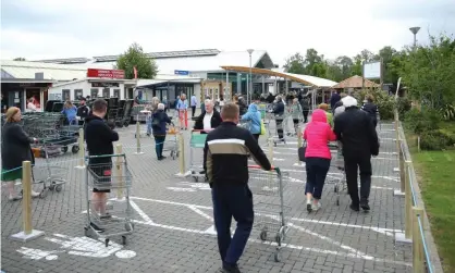  ??  ?? Customers wait at a garden centre. The ONS findings will inform the government’s next steps on easing the lockdown. Photograph: Warren Little/Getty Images