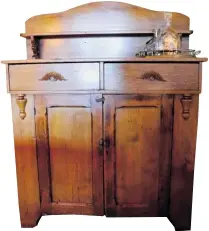  ??  ?? A kitchen sideboard is a country version of a more formal Empire-style sideboard from the 1800s.