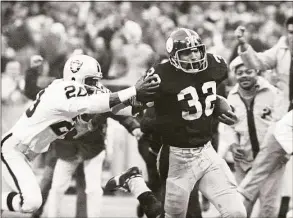  ?? Harry Cabluck / Associated Press ?? Pittsburgh Steelers’ Franco Harris (32) eludes a tackle by the Raiders’ Jimmy Warren as he runs 42-yards for a touchdown after catching a deflected pass during an AFC Divisional playoff game in 1972.