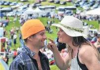  ?? PHOTOS: CHRISTINE O’CONNOR ?? Red nose day . . . Katrina Shephard puts sunscreen on partner Alex Gardener’s nose.