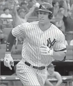  ?? File, Bill Kostroun / AP ?? New York Rookie of the Year Aaron Judge rounds the bases against Toronto.