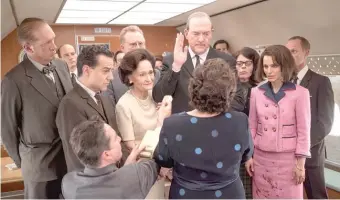  ??  ?? Jackie ( Natalie Portman) watches Lyndon Johnson ( John Carroll Lynch) take the oath of office.