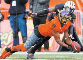  ?? BRYNN ANDERSON/ THE ASSOCIATED PRESS ?? Wide receiver Zay Jones (7) of East Carolina, the FBS’ career receptions leader, realizes good numbers only mean so much to those making evaluation­s at the NFL scouting combine.