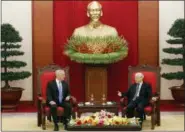  ?? TRAN VAN MINH - THE ASSOCIATED PRESS ?? U.S. Secretary of Defense Jim Mattis, left, listens during talks with Vietnam’s Communist Party General Secretary Nguyen Phu Trong in Hanoi, Vietnam, Thursday, Jan. 25, 2018. In a move likely to irritate China, a U.S. Navy aircraft carrier is likely to...